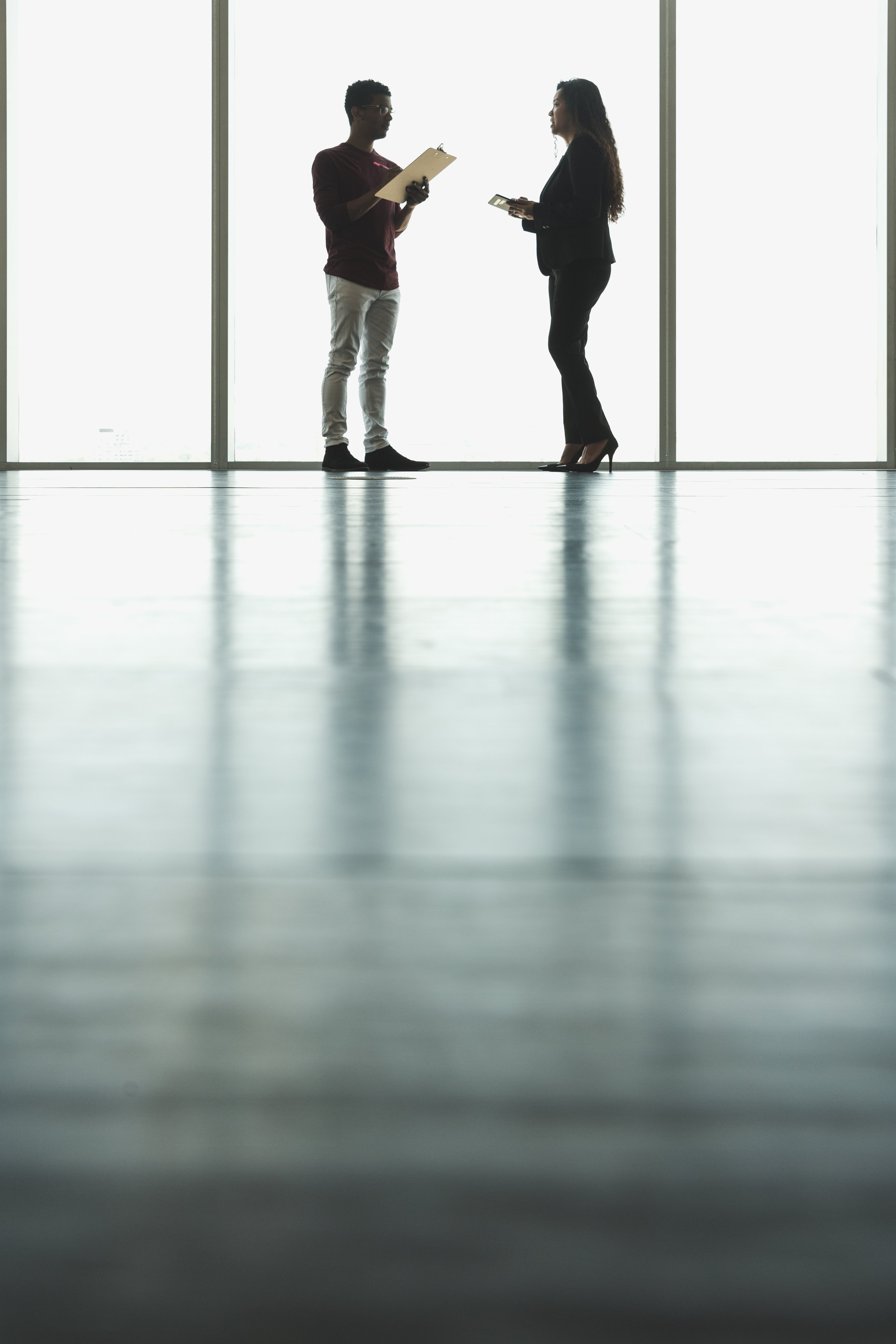 2 people by the window